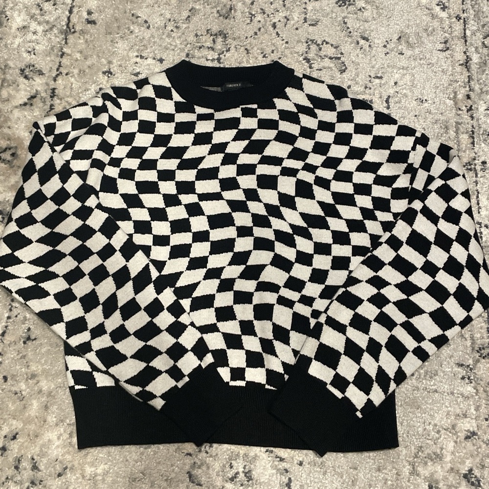 Black and white checkered sweater